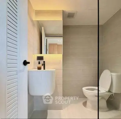 Modern bathroom with sleek design and ambient lighting
