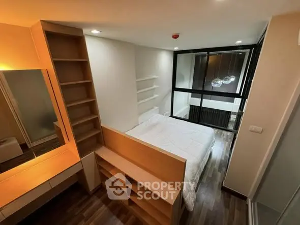 Modern bedroom with sleek design and ample storage space