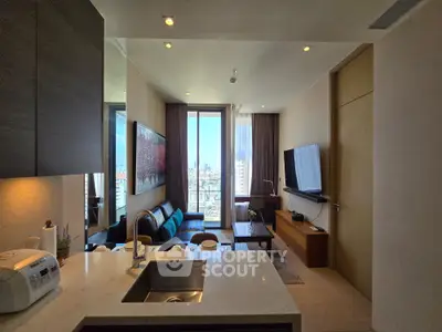 Modern living room with city view, open kitchen, and stylish decor in high-rise apartment.
