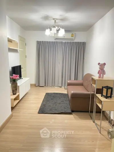 Modern living room with cozy sofa and elegant decor in a stylish apartment.