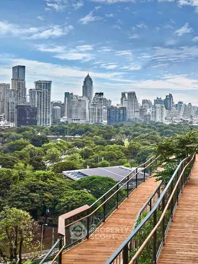 Stunning cityscape view from a modern rooftop garden with lush greenery and skyline backdrop.