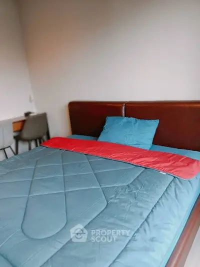 Cozy bedroom with modern decor and comfortable bedding