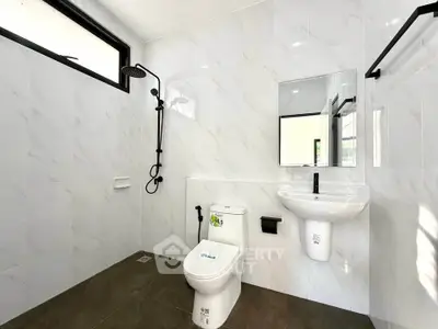 Modern bathroom with sleek fixtures and natural light