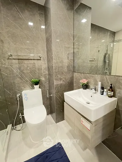 Modern bathroom with sleek design and elegant fixtures in luxury apartment