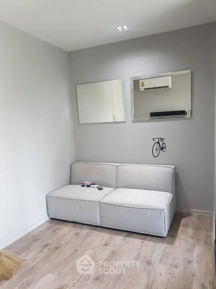 Cozy modern living room with minimalist decor and wall art