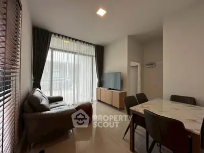 Modern living room with sleek furniture and natural light