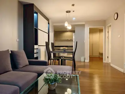 Spacious modern living room with elegant dining area and stylish decor
