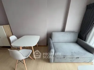 Modern living room with sleek furniture and natural light