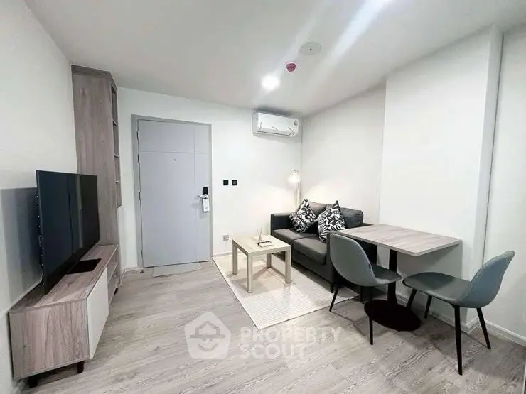 Modern minimalist living room with sleek furniture and neutral tones