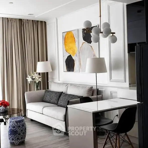 Modern living room with stylish decor and elegant lighting in a contemporary apartment.