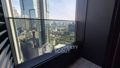 Stunning cityscape view from a modern high-rise balcony, showcasing urban living at its finest.