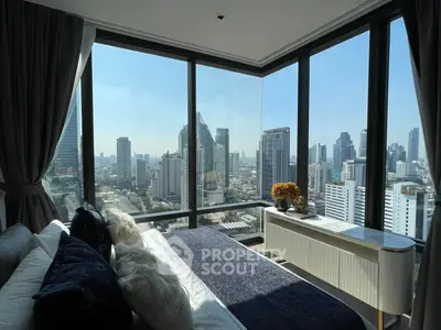 Luxurious bedroom with panoramic city view from floor-to-ceiling windows, modern decor and plush bedding.