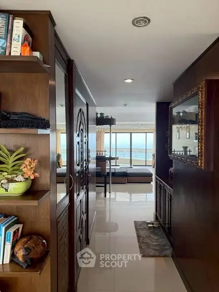 Luxurious living room with ocean view and elegant wooden decor