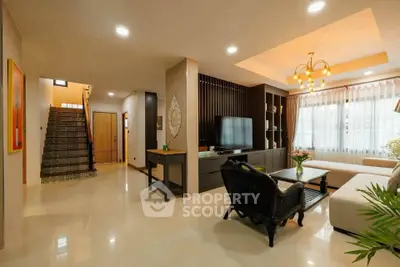 Spacious modern living room with elegant decor and natural lighting