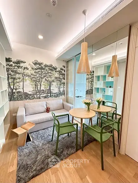 Chic living room with modern decor, featuring a cozy sofa, stylish dining set, and artistic wall mural.