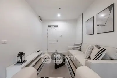 Modern minimalist living room with stylish decor and neutral tones