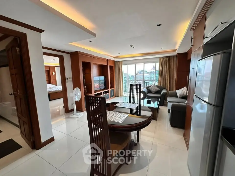 Spacious modern living room with balcony and elegant furniture