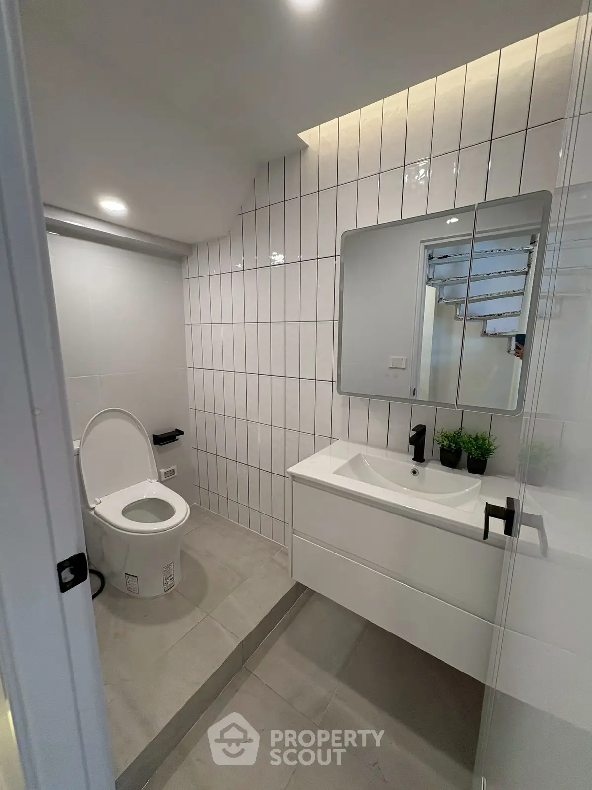 Modern bathroom with sleek fixtures and stylish tile design