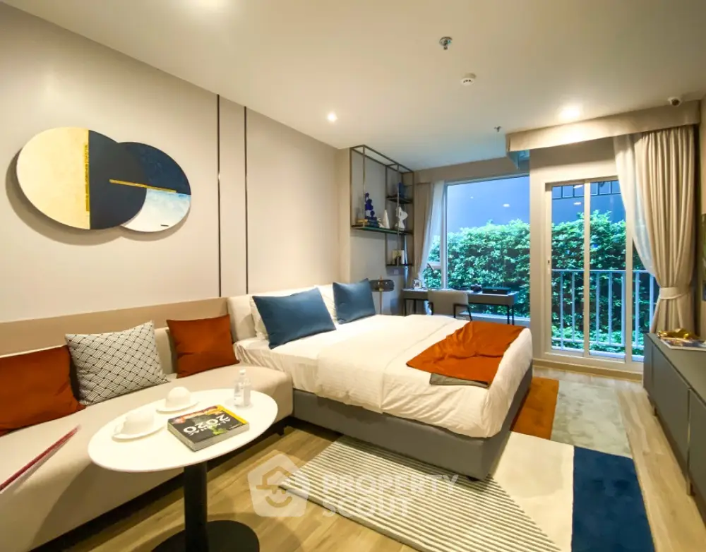 Modern bedroom with stylish decor and balcony view in luxury apartment