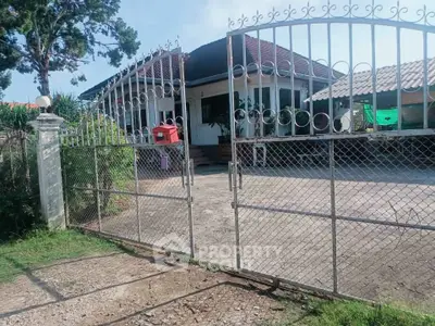 Charming suburban home with gated entrance and spacious driveway