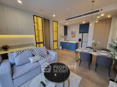 Modern open-plan living room with stylish decor and dining area