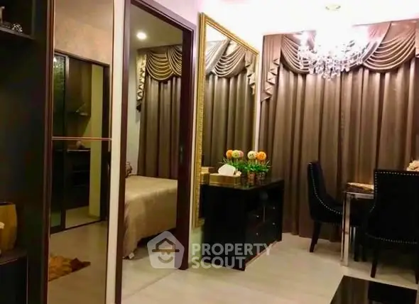 Luxurious apartment interior with elegant dining area and cozy bedroom view.