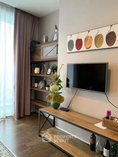 Stylish living room with modern decor and wall-mounted TV, featuring elegant shelving and floor-to-ceiling windows.