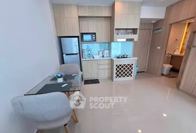 Modern open kitchen with dining area in a stylish apartment