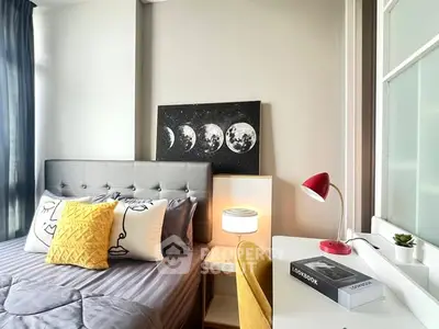 Modern bedroom with stylish decor and cozy workspace