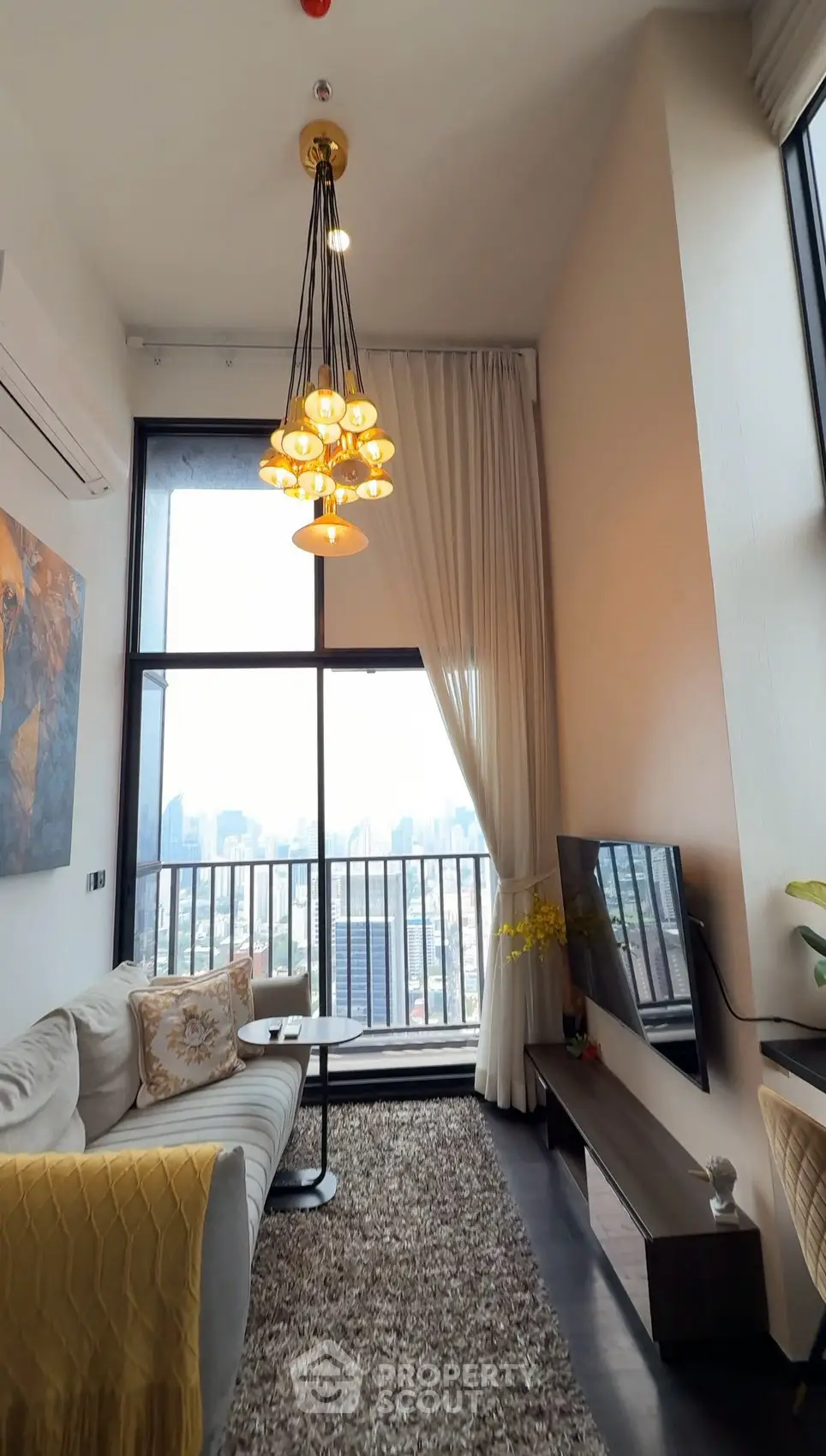 Luxurious high-rise living room with stunning city view and elegant decor
