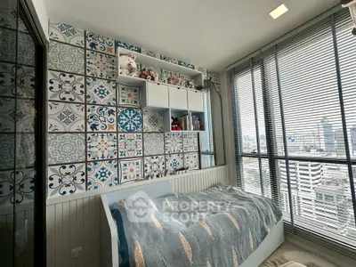 Charming bedroom with city view, featuring patterned wall tiles and cozy bed setup.