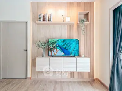 Modern living room with stylish TV setup and elegant decor