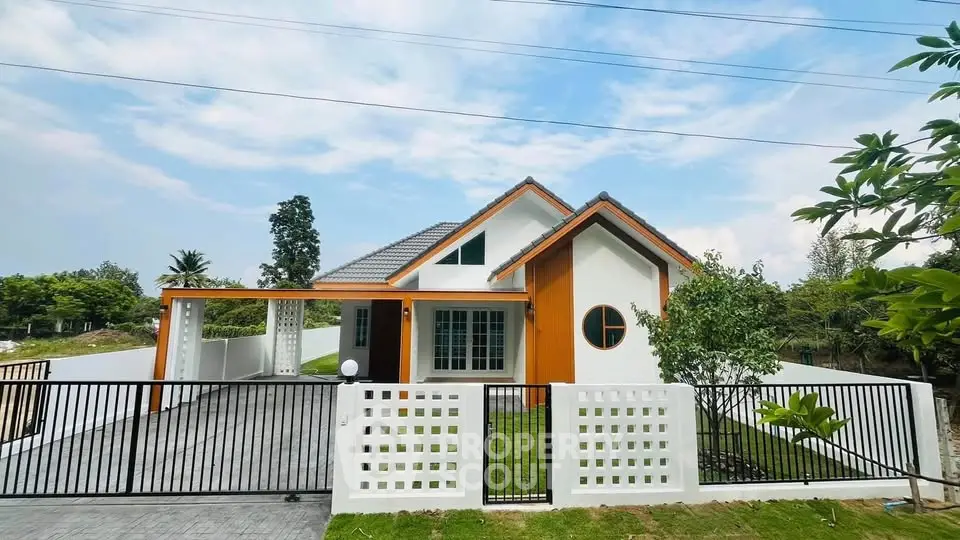 Charming modern house with unique architecture and spacious driveway in a serene neighborhood.