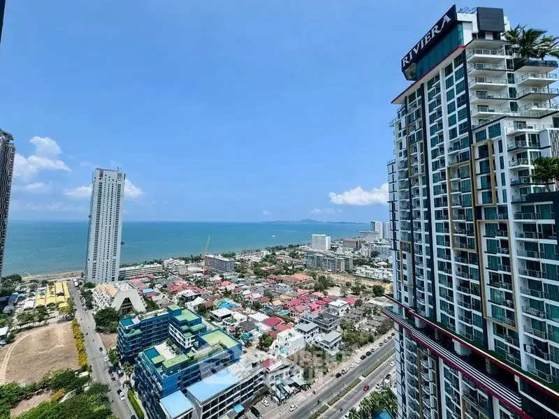 Stunning high-rise building with ocean view in vibrant cityscape