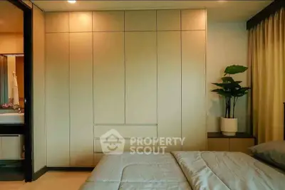 Modern bedroom with built-in wardrobe and cozy decor