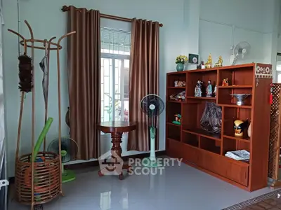 Charming living room with elegant wooden furniture and decorative accents