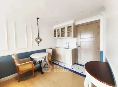 Charming kitchen with elegant dining nook and stylish cabinetry