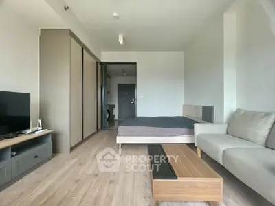 Modern studio apartment with sleek furnishings and open layout