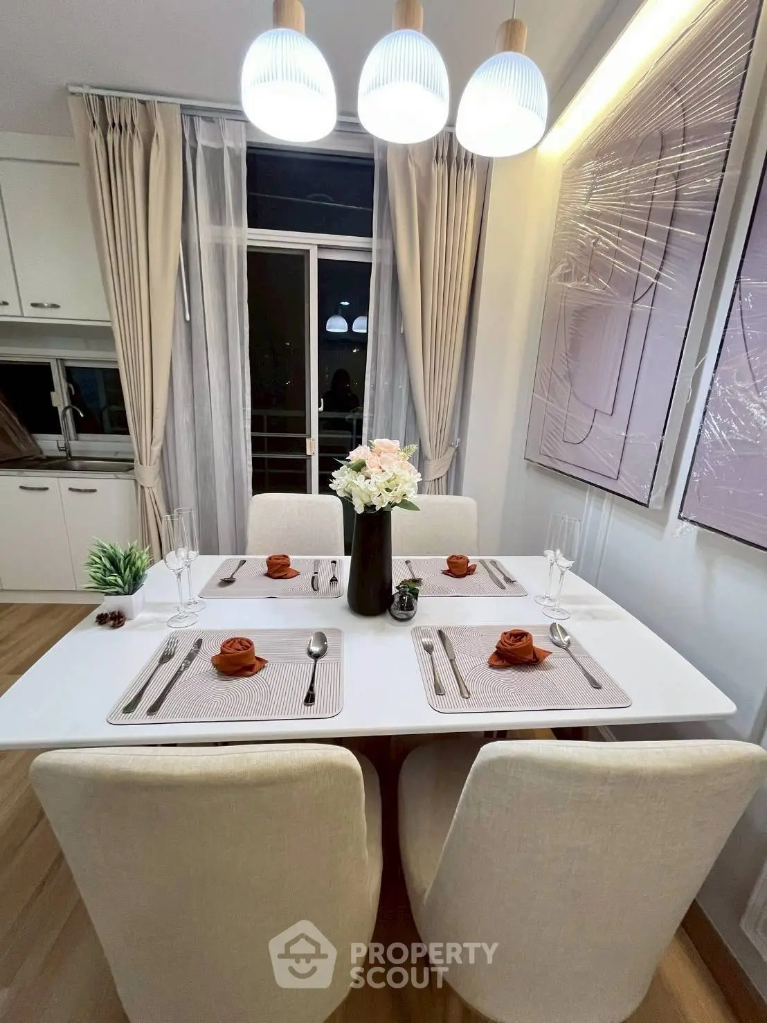 Elegant dining area with modern decor and ambient lighting, perfect for intimate gatherings.