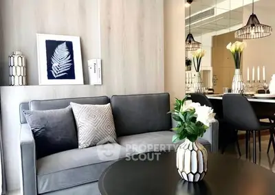 Stylish modern living room with elegant decor and cozy seating area.