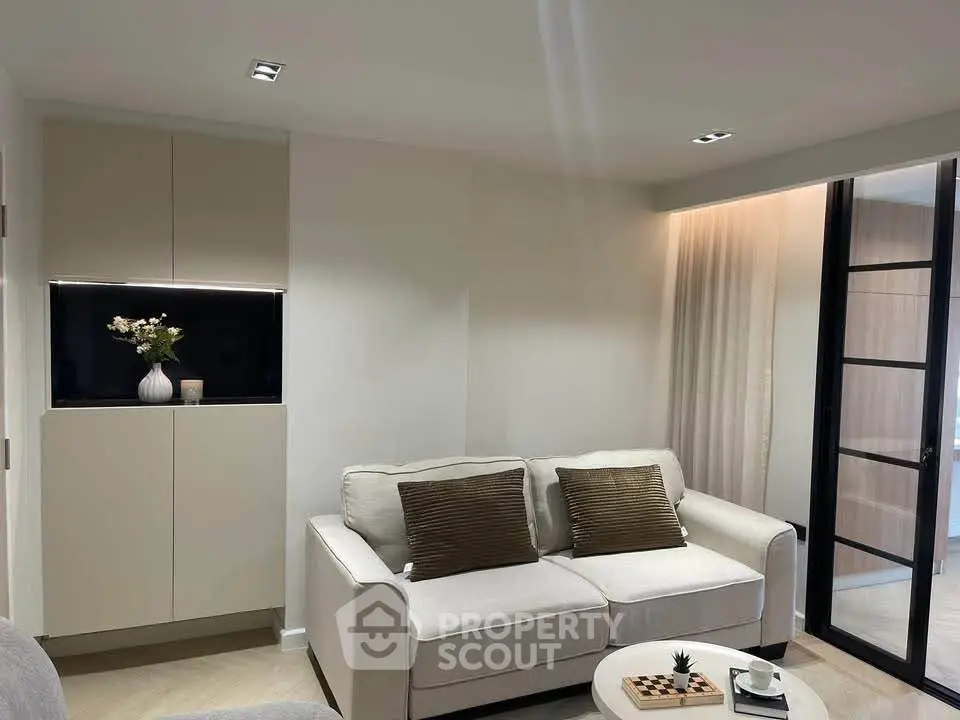 Modern living room with cozy sofa and elegant decor