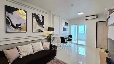 Modern living room with elegant decor and balcony access