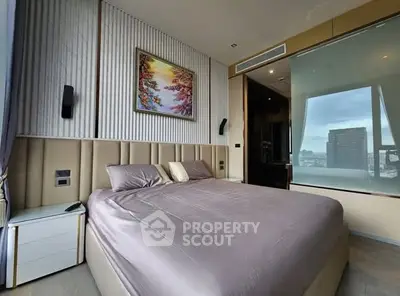 Luxurious bedroom with modern decor and stunning city view