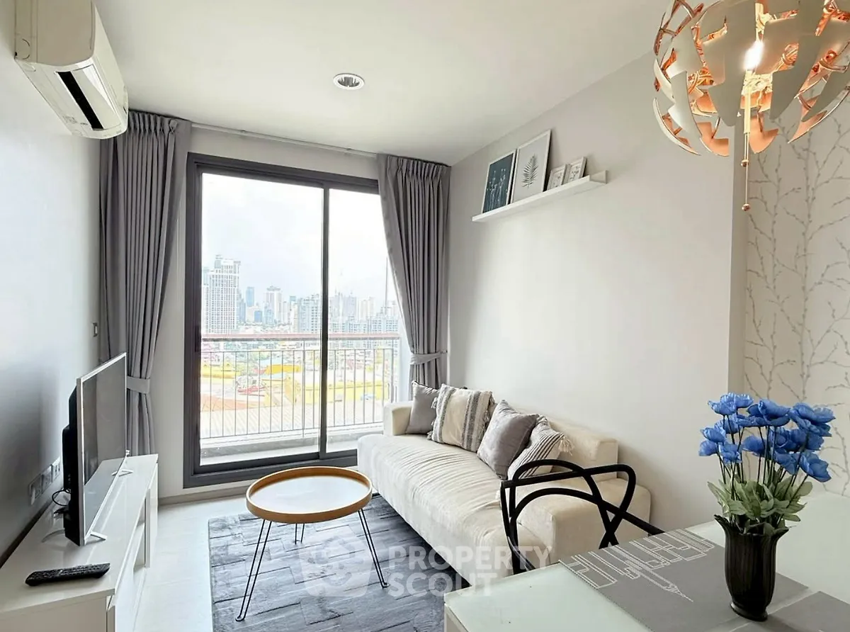 Modern living room with city view, stylish decor, and cozy seating area.