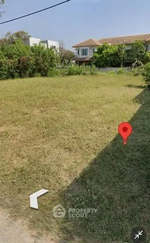 Spacious vacant land plot in a serene residential neighborhood, ideal for building a dream home.