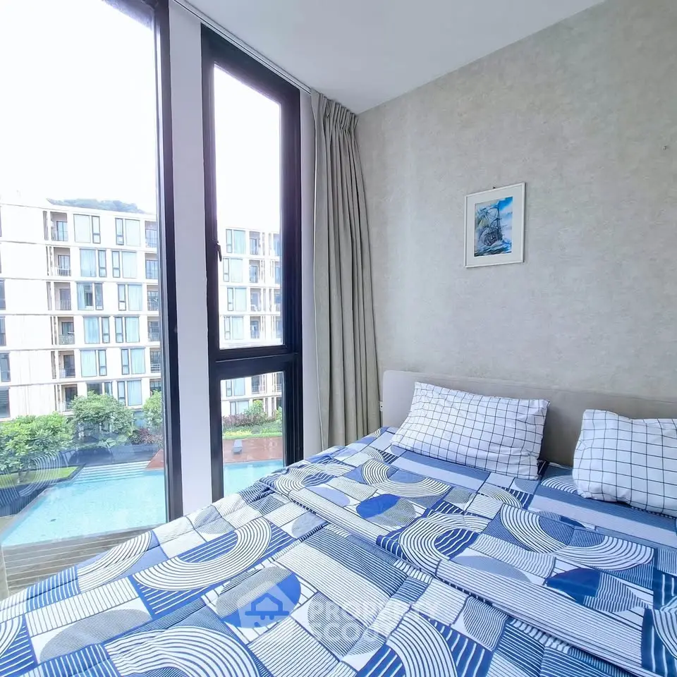 Modern bedroom with pool view in luxury apartment