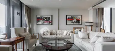 Luxurious modern living room with elegant decor and stunning city view.