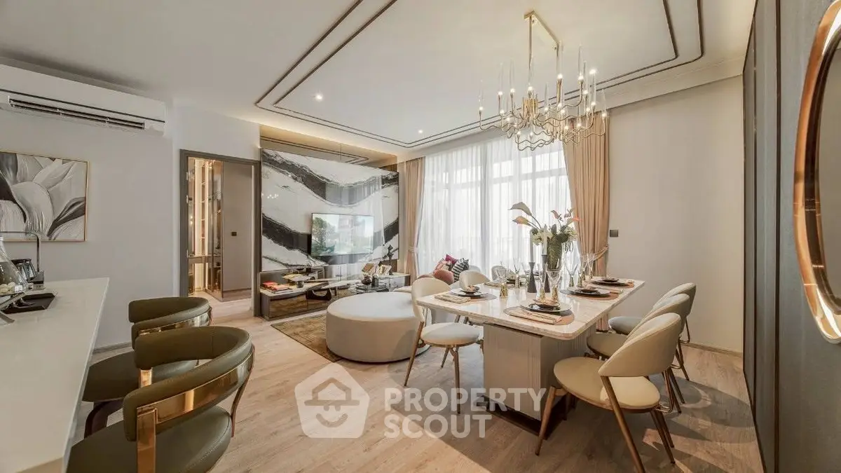 Luxurious modern living and dining area with elegant decor and ample natural light.