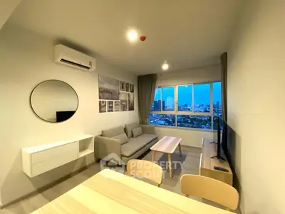 Modern living room with city view, stylish decor, and cozy ambiance.