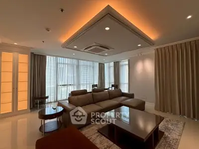 Luxurious living room with modern furnishings and ambient lighting